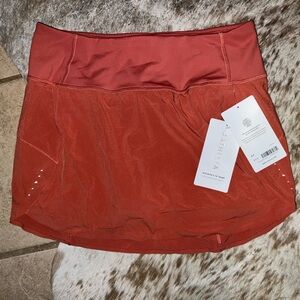 Athleta Run With It 14” Skort Jupe-Short Run With It - Burnt Orange Size Small